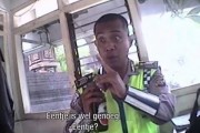 Bali traffic police officer caught on camera extorting bribe from Dutch tourist.