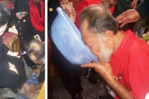 Old man drinking water used to wash Megawati's feet